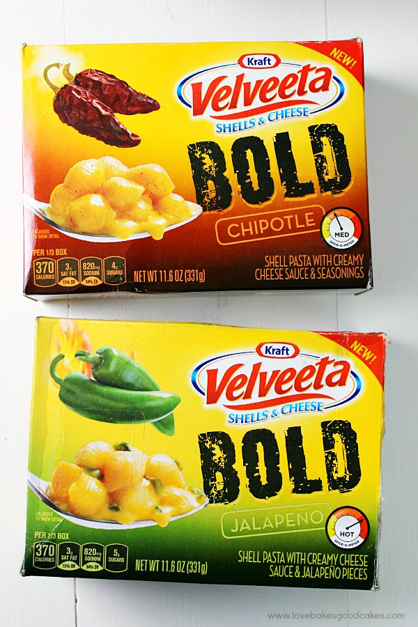 Two packages of Velveeta Bold cheese.