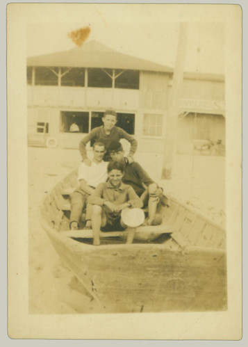 Three men in a Rowboat