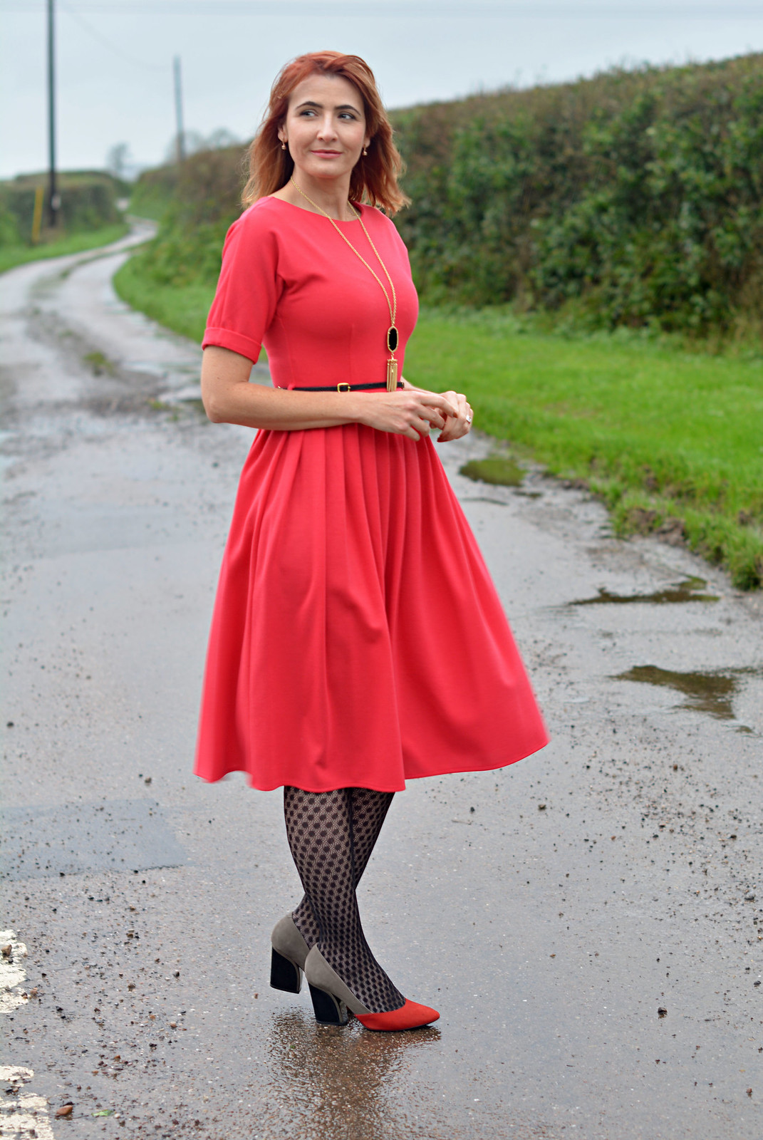 Red fit and flare dress, patterned tights