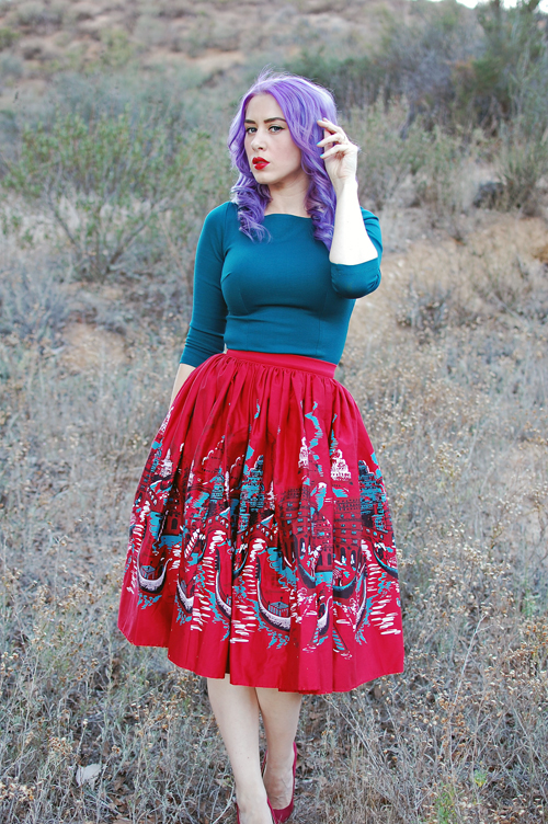 Pinup Girl Clothing Pinup Couture Jenny Skirt in Italian Landscape print Laura Byrnes Sabrina Top in Teal