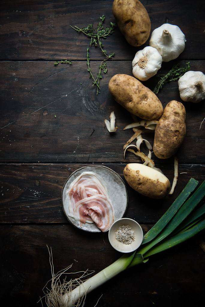 potato, garlic, & leek soup | two red bowls