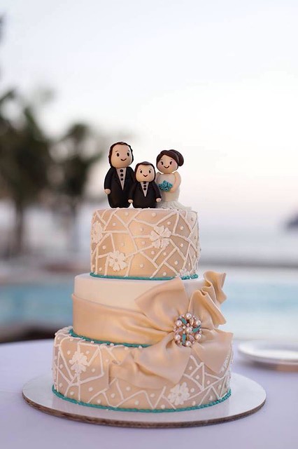 Teal and Champagne Cake i made the toppers are the bride groom and their son by Louvie Guevarra of Keiks