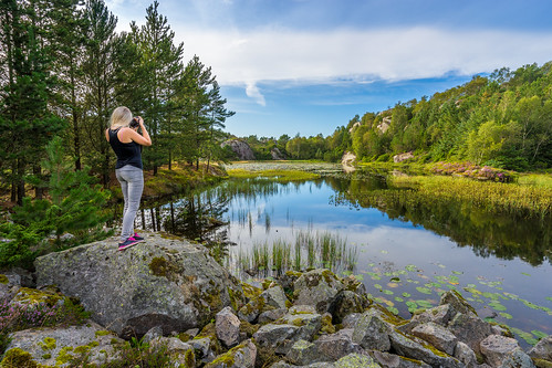 blue trees sky lake reflection nature water colors girl norway rock marie lady clouds zeiss reflections landscape mirror norge pond model rocks day photographer sony norwegen peaceful visit calm clear richard a7 hordaland bømlo 1635 nesse visitnorway ranveig larssen richardlarssen sel1635z