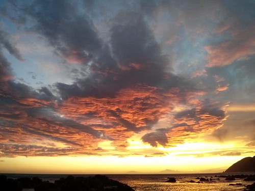 sunset sea clouds coastal crepusular