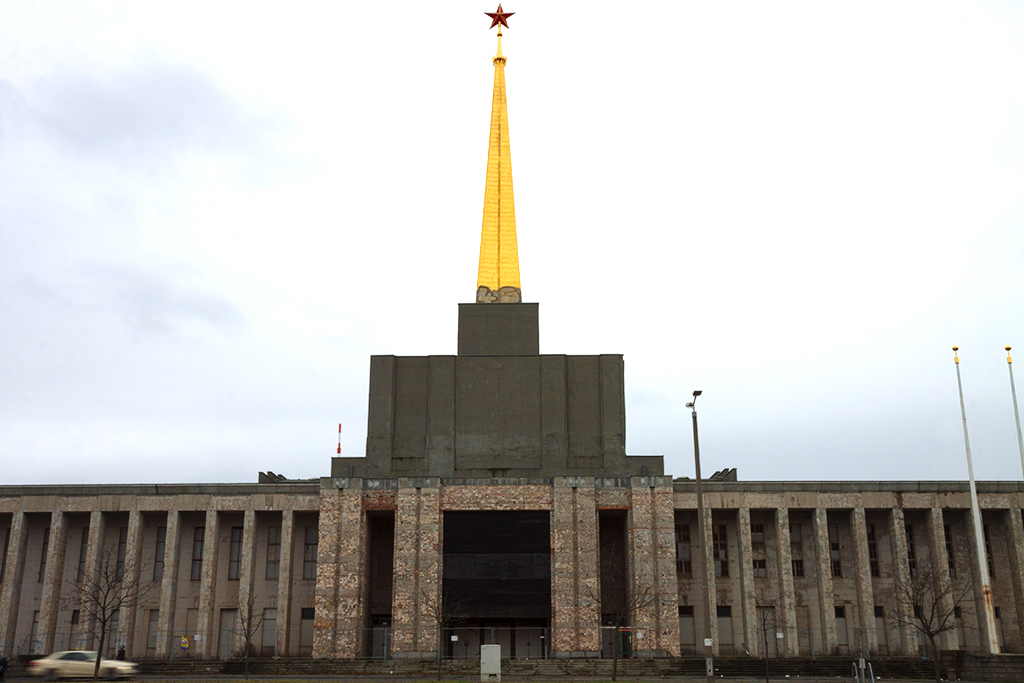 Communist building with red star topped spire--Leipzig