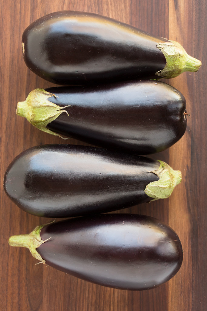 Eggplant lined up on board