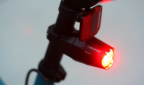 Fortified locking bicycle lights mounted to bike