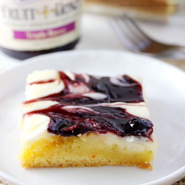 This Triple Berry Ooey Gooey Butter Cake is the perfect dessert anytime! Although it looks like you fussed, it's easy to make! #FruitAndHoney #ad