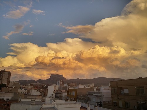 city sunset sky mountain storm clouds landscape