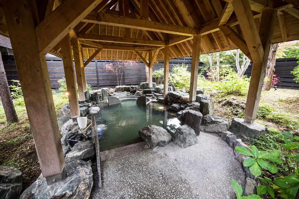 The outdoor pool at the Mizu no Uta Onsen, Lake Shikotsu, Hokkaido, Japan