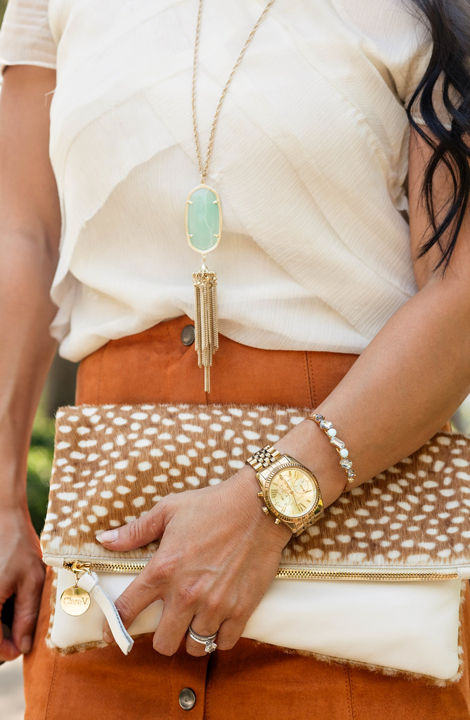 cute & little blog | petite fashion | kendra scott necklace rayne necklace, suede skirt, clare vivier foldover clutch, rocksbox | fall outfit accessories