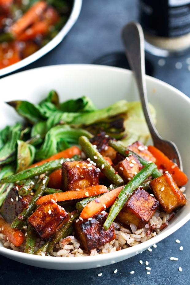 Sesame Ginger Tofu and Veggie Stir Fry - Loaded with so much flavor and completely vegetarian friendly! #tofustirfry #stirfry #veggiestirfry | Littlespicejar.com