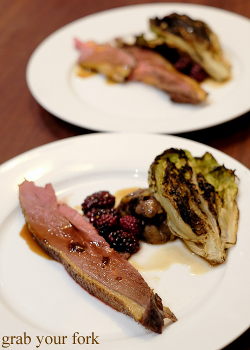 Roasted muscovy duck with chargrilled gem lettuce hearts and grilled blackberries