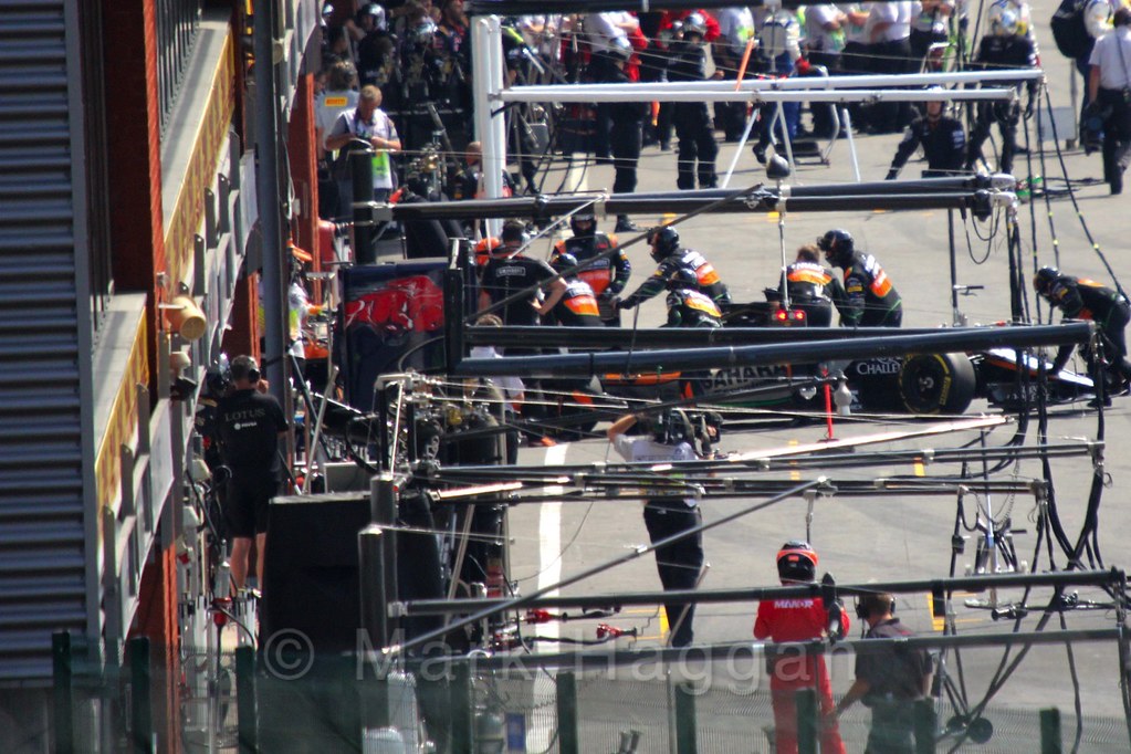 Nico Hulkenberg's Force India returns to the pits after stalling on the grid at the 2015 Belgium Grand Prix