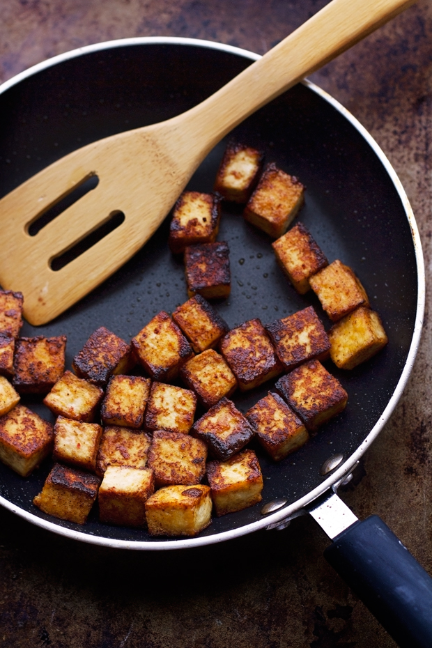Sesame Ginger Tofu and Veggie Stir Fry - Loaded with so much flavor and completely vegetarian friendly! #tofustirfry #stirfry #veggiestirfry | Littlespicejar.com