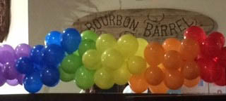 Rainbow balloon decorations at Bourbon Barrel