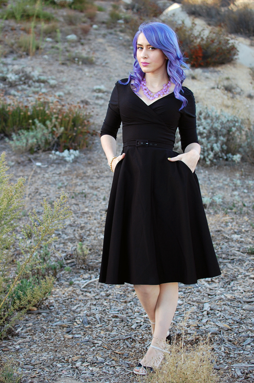 Pinup Girl Clothing Pinup Couture Erin Swing Dress in Three-Quarter Sleeves in Black