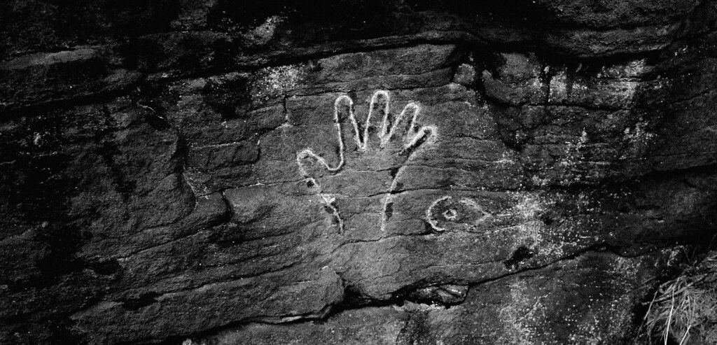 Perhaps the Devil's work continues here? A curious hand and eye, scratched into the side of Scar Top.