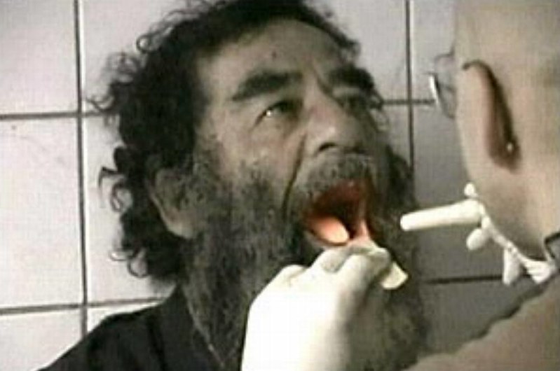 Saddam Hussein is captured by the U.S. 4th Infantry Division