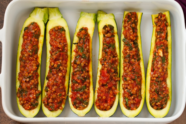 Lentil Stuffed Zucchini Boats - Less than 115 calories per boat and a whopping 8 grams of protein! These are so easy and delicous! #vegetarian #zucchiniboats #stuffedzucchiniboats | Littlespicejar.com @littlespicejar