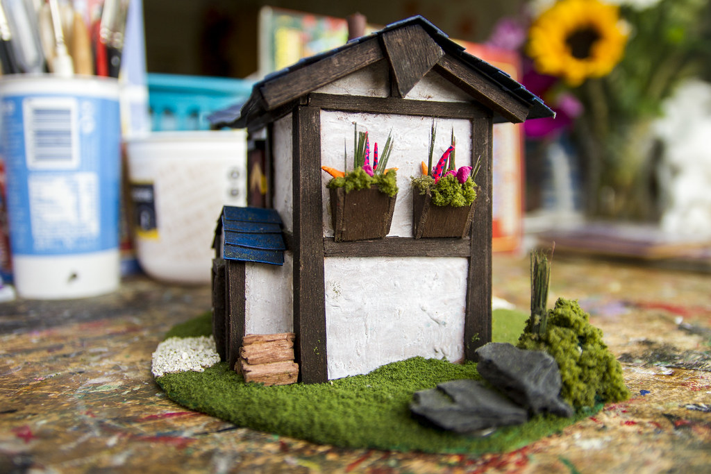 Model House: Side view with flower baskets