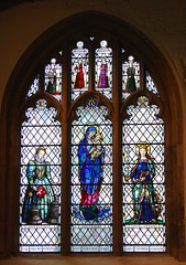 Elizabeth I, Blessed Virgin and Child and St Katharine by Arthur Buss (north aisle chapel)