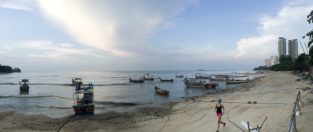 Beach and boats at Tsunami Village Cafe