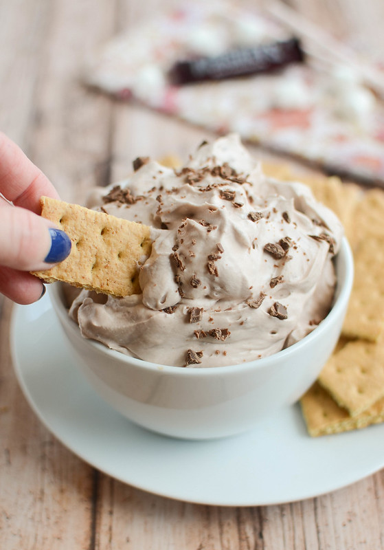 S'mores Fluff - creamy dessert dip made with marshmallow creme and chocolate pudding. Plus, chocolate and marshmallow folded in! Serve with graham crackers or fresh fruit! 
