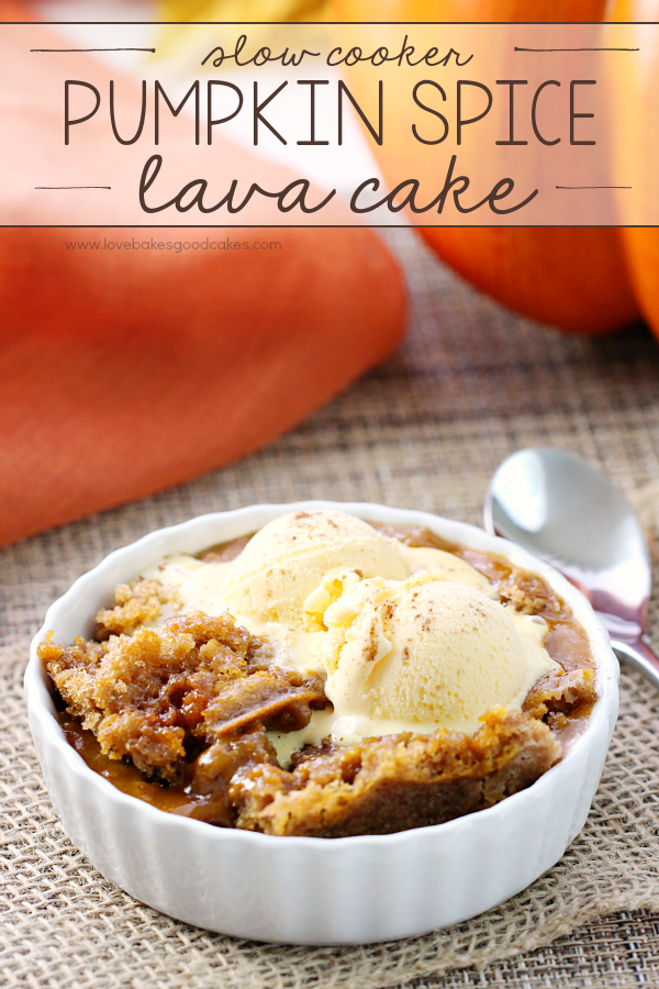 Slow Cooker Pumpkin Spice Lava Cake in a white bowl with ice cream and a spoon.