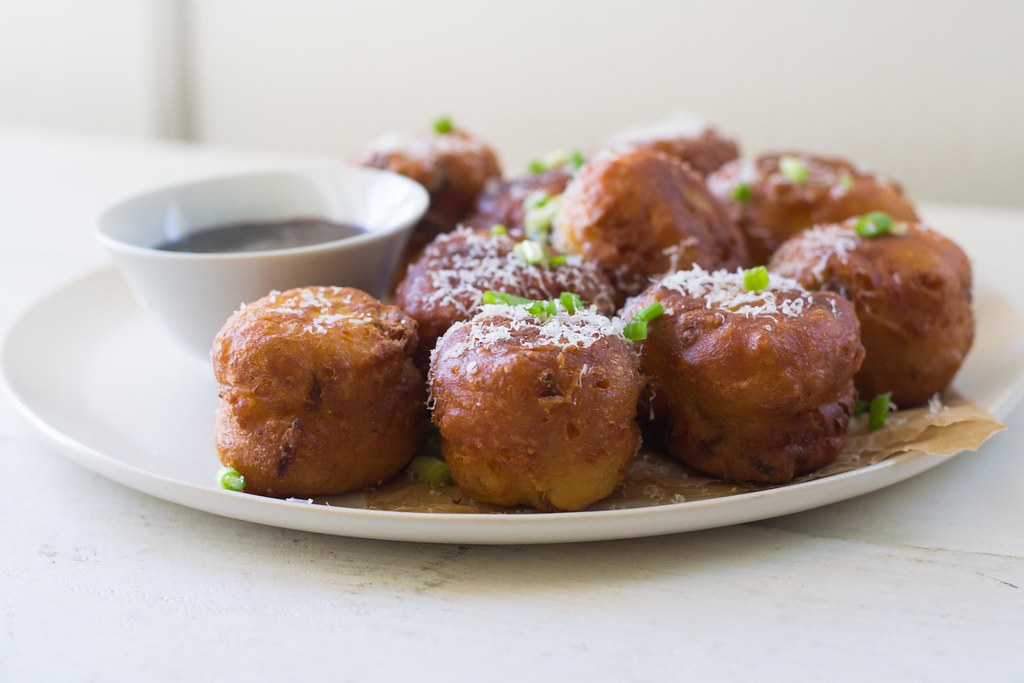 Savory Hatch Chile and Cheddar Donuts with Raspberry Wine Sauce