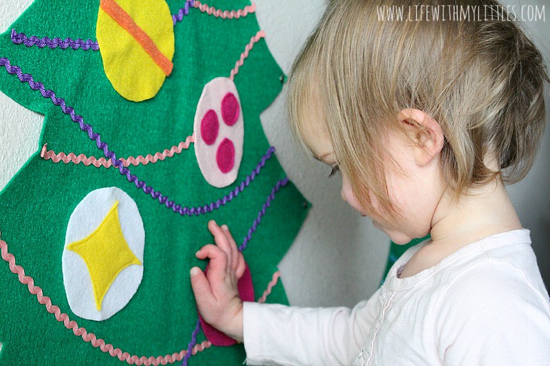 Tips for a toddler-friendly Christmas that will be as magical as it sounds! Follow these ten great tips for decorating for Christmas when you have a toddler or baby at home, and your decorations will actually last until Christmas!
