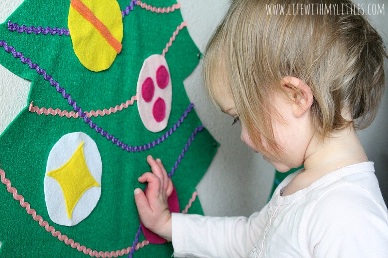 These DIY Felt Christmas Trees are so cute, so easy, and so fun! What a great way to keep your kids busy during the holidays! And I love that it's toddler-friendly!