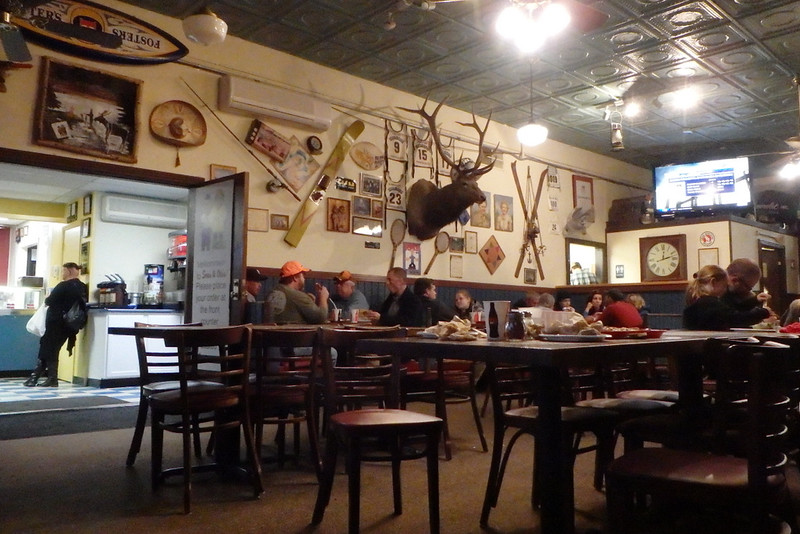 restaurant with local memorabilia on the walls, Twins game on the tv