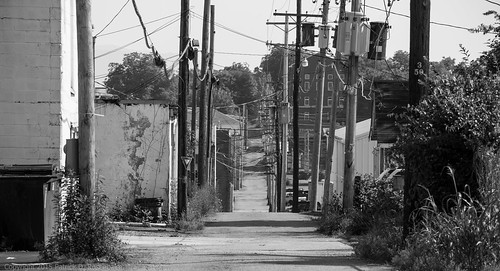street blackandwhite bw buildings ally streetphotography backstreet poles phonepoles powerpoles 70d
