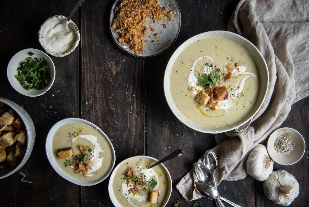 potato, garlic, & leek soup | two red bowls