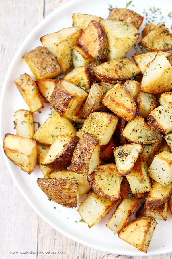 Oven Roasted Potatoes on a white plate.