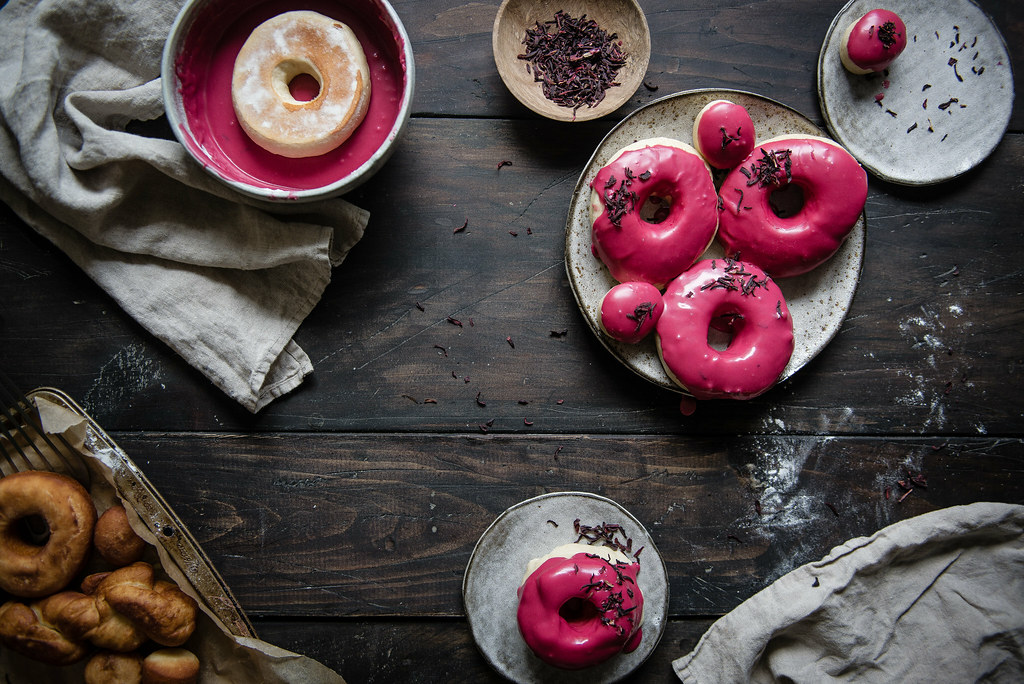 baked yeast doughnuts with hibiscus glaze | two red bowls