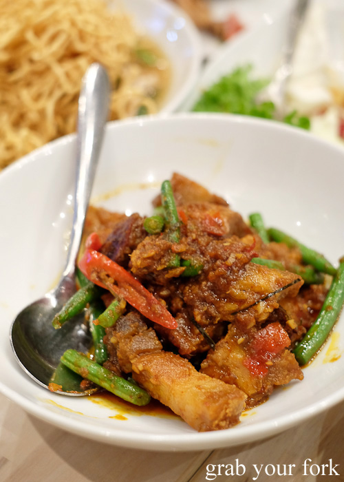 Pad prik king crispy pork belly at Kin Senn Thai street food restaurant, Sydney