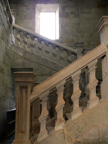 The staircase in the converted monastery at Parador de Santo Estevo leads up to a wonderful permanent art show.