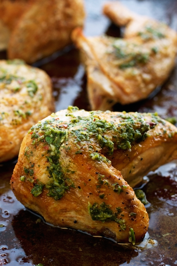 Quarted ROasted Chicken with Chimichurri Sauce - 5 simple ingredients and this is truly the crispiest chicken you'll ever experience! #chimichurrisauce #roastedchicken #bakedchicken #crispychicken | Littlespicejar.com