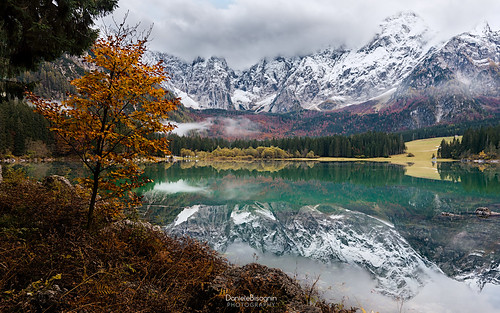 autumn trees sunset italy orange lake snow mountains alps green nature water colors yellow mirror woods reflect dolomites