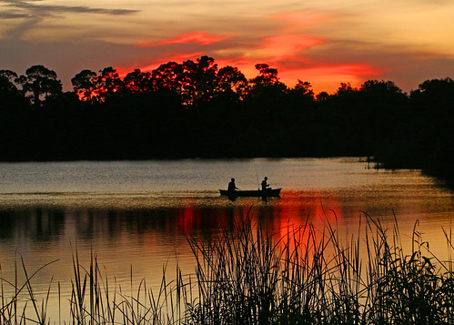sunset boat fishing pond fishermen florida canoe fortpierce georgelestrangepreserve