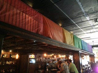 Rainbow banner decoration at Bourbon Barrel