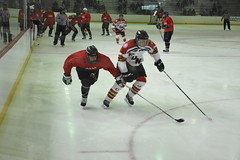 Beth Hanrahan fighting for a loose puck