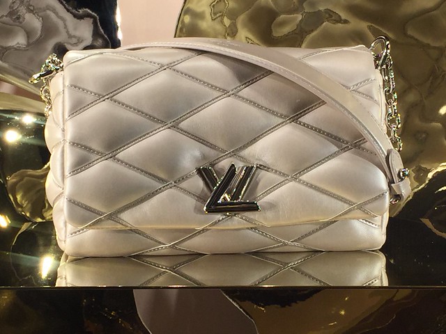 white LV leather bag