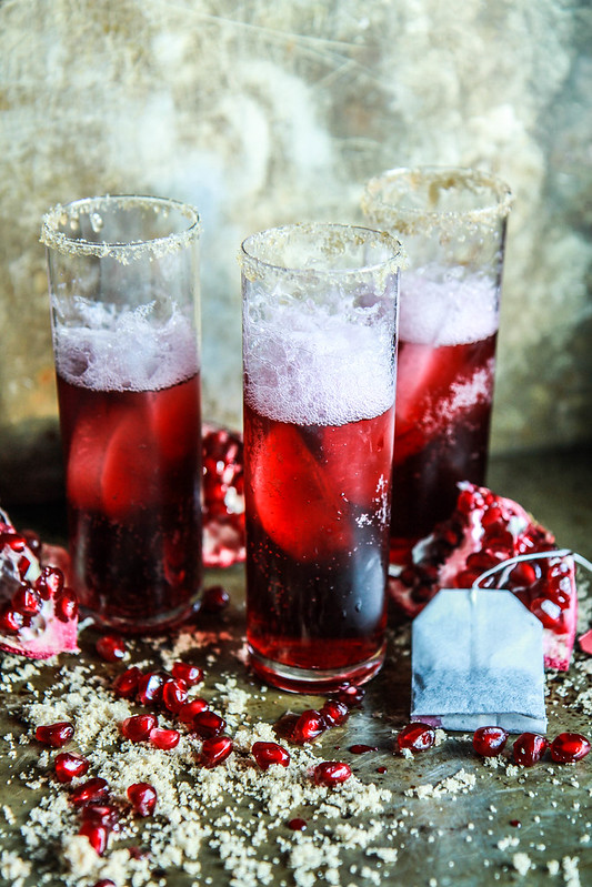 Prosecco Pomegranate Black Tea and Currant Cocktails