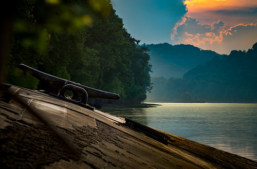 old trees light sunset sky color abandoned nature water metal horizontal clouds forest river outdoors boat us rust unitedstates zoom nobody structure glenwood telephoto westvirginia shore rusted riverbank derelict barge cleat ohioriver goldenhour greenbottom