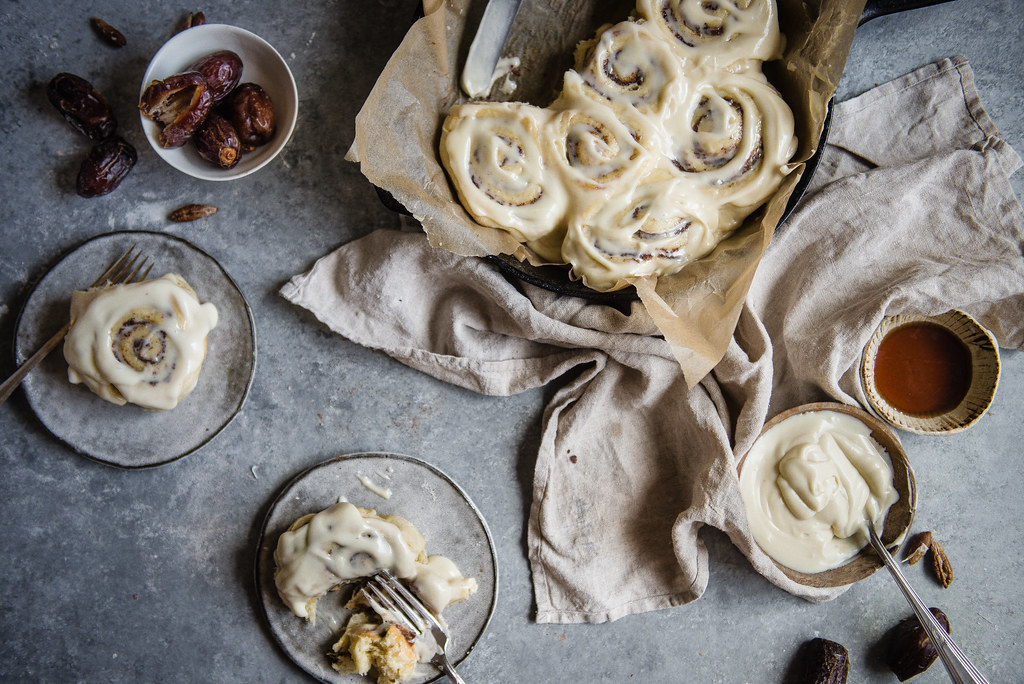 sticky date cinnamon rolls | two red bowls