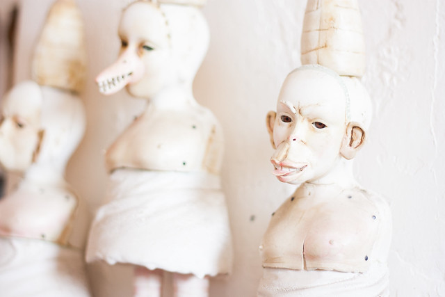 Faces of Judy Kendall's daughter-in-law's humanoid figures